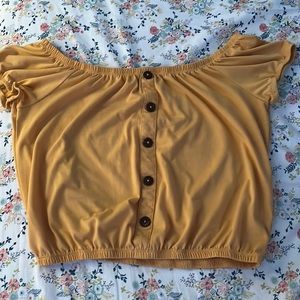 This yellow, crop top is very comfortable and is not to short when worn:)